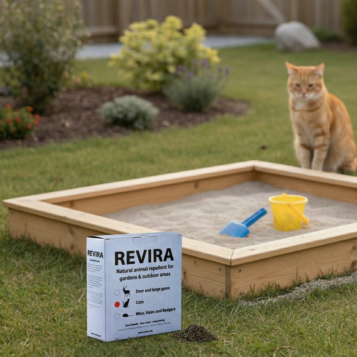 cat deterrent in front of sandbox in garden
